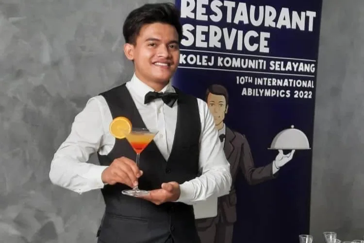 Muhammad Hanif Naufal Bin Mohd Mazni in restaurant service attire, representing Malaysia.